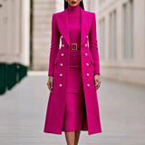 Rose Red double-breasted long coat worn over matching belted knit midi dress