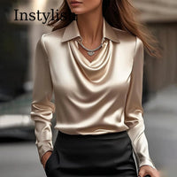 Loose-fit faux-silk satin blouse shown from the side