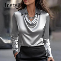 Close-up of the lapel V-neckline on the satin faux-silk shirt