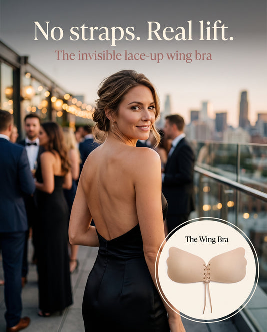Woman in a backless strapless black dress with no visible straps, wearing the invisible lace-up wing bra