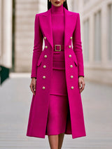 Rose Red double-breasted long coat worn over matching belted knit midi dress