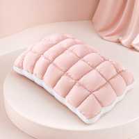 MarshmallowBreeze blush-pink puff pillow on a soft pink studio background
