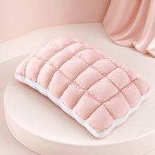 MarshmallowBreeze blush-pink puff pillow on a soft pink studio background